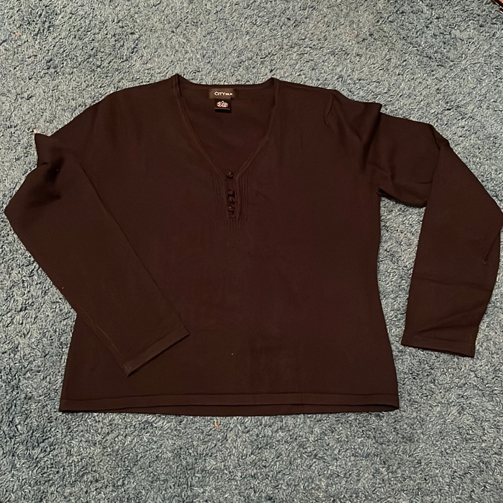 Black long sleeve sweater.